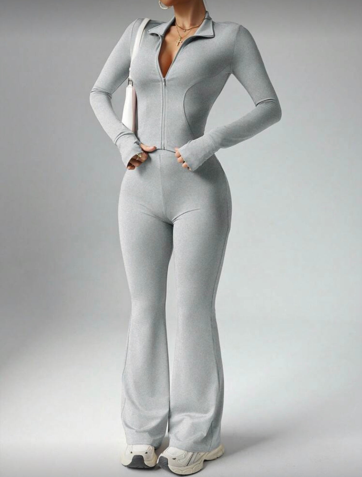 Conjunto Deportivo Moldeador con Cierre y Pantalón Acampanado
✨ Entrena, sal o viaja con estilo y comodidad total